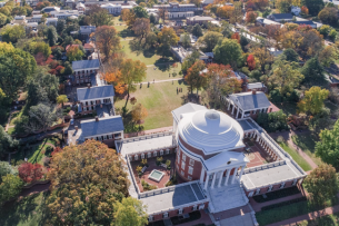 An aerial view of a green college campus, with a rotunda in the center